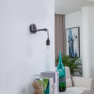 Nástenné svietidlo Lindby Elira, čierne, kov, Ø 10 cm, E27