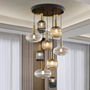 Závesná lampa Norma, Ø 80 cm, 9 svetiel, čierna/mosadz, sklo