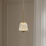 Nuura LED závesné svietidlo Asteea 1, Ø 12 cm, mosadzová farba/číra